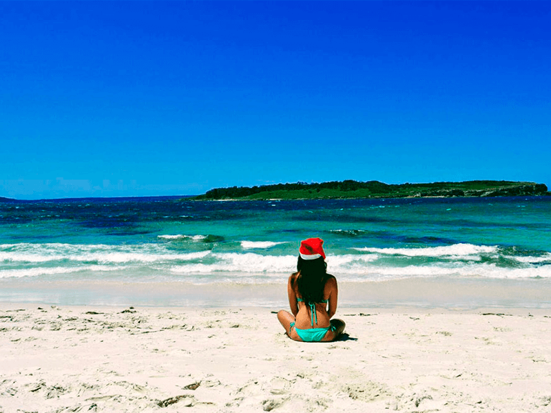 Estudiante de YouTooProject en una playa de Sídney